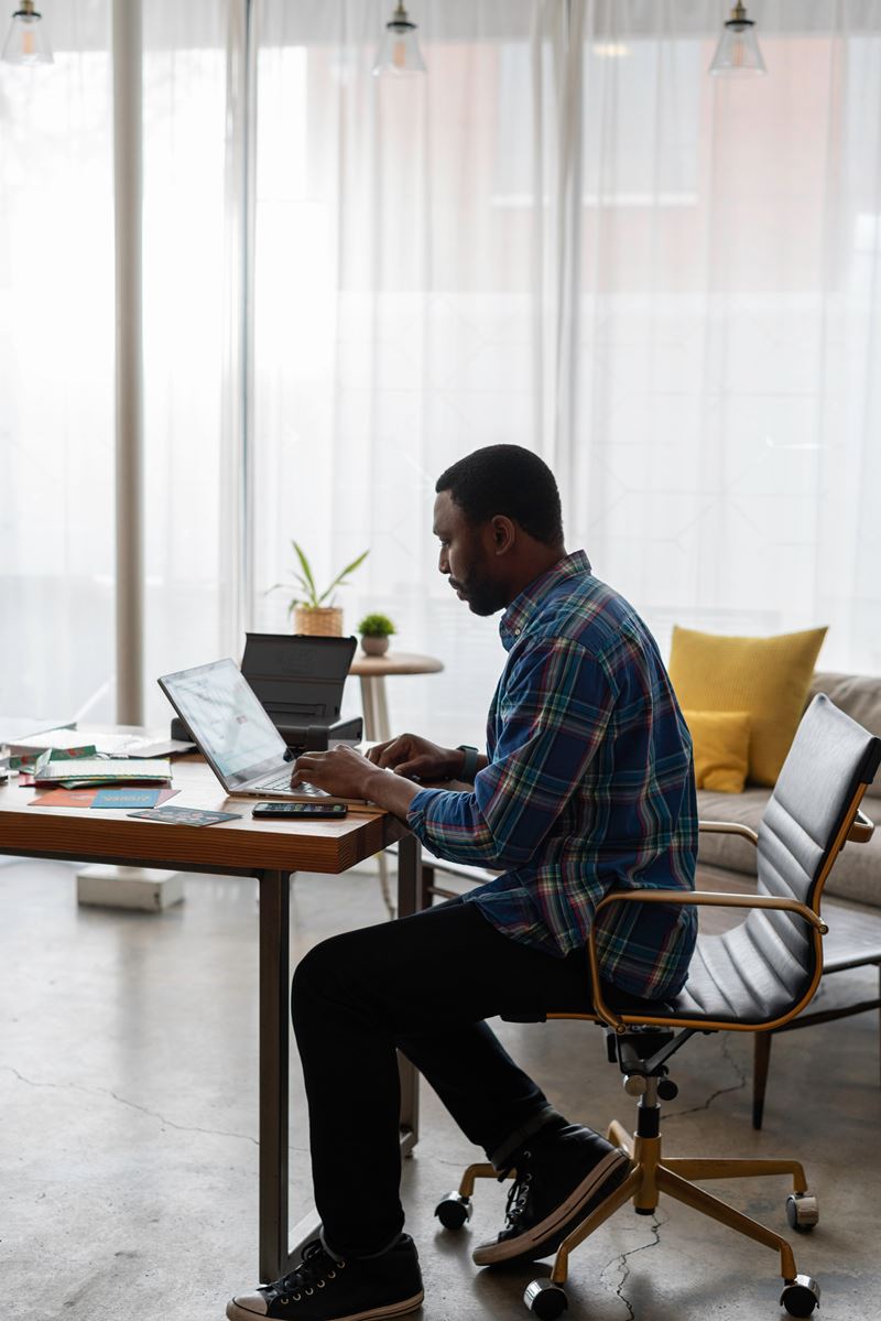 Man working at home on computer